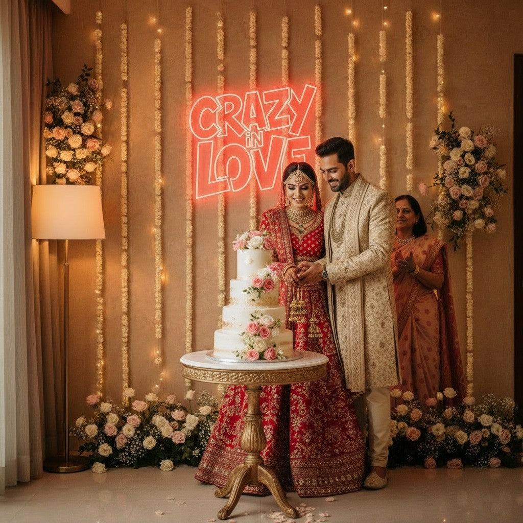 Lux Neon "Crazy in Love" neon sign in red, set behind a pregnant couple.